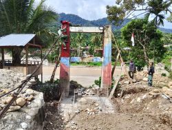 Kodim 0108/Agara Cat Pondasi Jembatan Gantung di Ds. Kuning Abadi, Aceh Tenggara