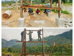 Kodim 0108/Agara Laksanakan Penyambungan Besi Penahan Pylon Jembatan Gantung di di Ds. Teger Miko, Aceh Tenggara,