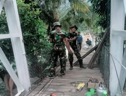 Kodim 0108/Agara Bersama Warga Bangun Tanggul Penahan Akses Jembatan Gantung Perintis, di Ds. Kumbang Jaya, Aceh Tenggara