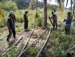 Kodim 0108/Agara dan Warga Bersihkan Lahan Calon Pembangunan Jembatan Gantung di Desa Rambung Jaya, Aceh Tenggara