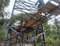Kodim 0108/Agara Bersama Warga Kebut Pemasangan Papan Lantai Jembatan Gantung Perintis Lawe Ger Ger Aceh Tenggara